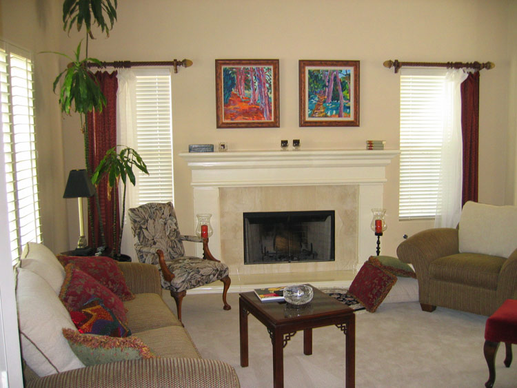 Two paintings displayed in a home interior