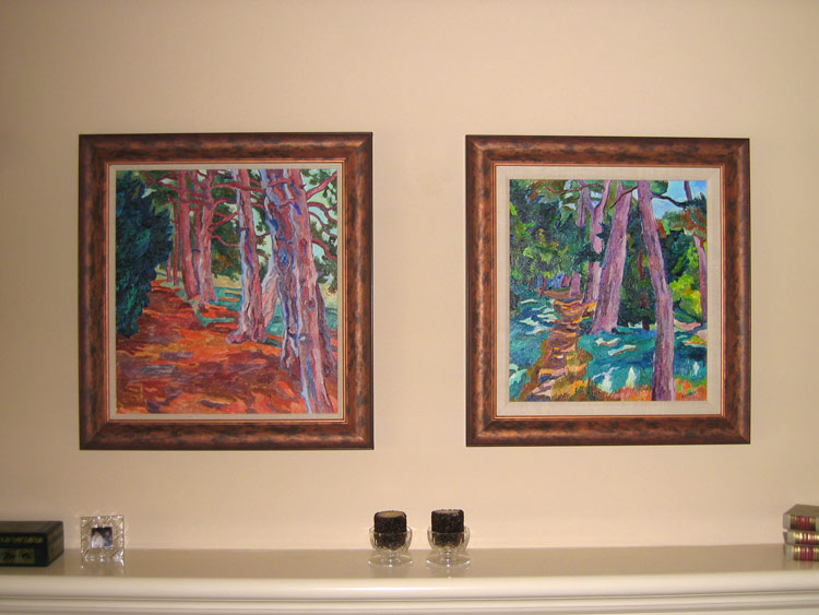 Two paintings displayed in a home interior