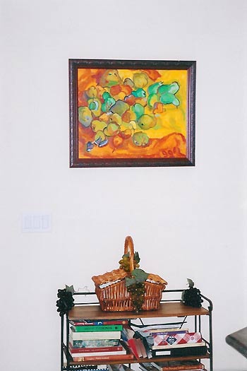 Still life with pears painting in a home interior